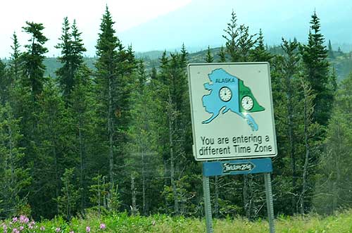 Sign You are entering a different Time Zone time change entering Yukon from Alaska Klondike Highway Alaska-Yukon Territory Photo Alexander Krivenyshev WorldTimeZone