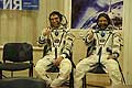 Soyuz TMA-02M crew dons their spacesuits and suit pressurization check before the launch