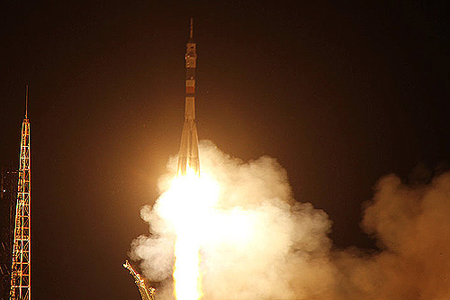 Soyuz TMA-02M lifts off from Baikonur Cosmodrome on June 8 2011 with three new Expedition 28 crew members NASA astronaut Mike Fossum, Russian cosmonaut Sergei Volkov and Japan Aerospace Exploration Agency astronaut Satoshi Furukawa