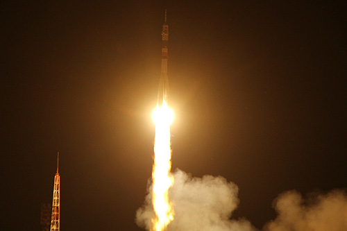 Russian Soyuz TMA-02M lifts off for the International space station Mike Fossum, Sergei Volkov and Satoshi Furukawa will meet NASA final Shuttle Atlantis mission STS-135
