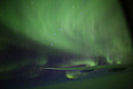Aerial view of Northern Lights Aurora Borealis and the Big Dipper Constellation Ursa Major from an airplane