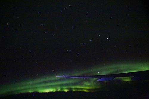 Big Dipper and Aurora Borealis out the airplane window Photo Alexander Krivenyshev WorldTimeZone