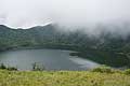 Volcano Bisoke crater lake Virunga Mountains border of Rwanda and Congo