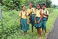 Children are walking back from school Upolu Samoa