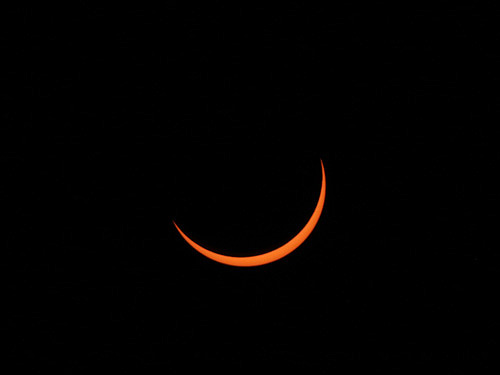 Partial solar eclipse phase  before the Ningaloo Total solar eclipse in Exmouth, Australia worldtimezone world time zone Alexander Krivenyshev