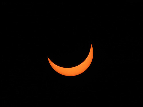 Partial solar eclipse phase  before the Total solar eclipse in Exmouth, Australia worldtimezone world time zone Alexander Krivenyshev