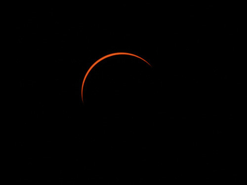 Partial solar eclipse phase after the Total solar eclipse in Exmouth, Australia worldtimezone world time zone Alexander Krivenyshev