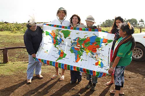 Visitors and local Rapanui people with World Time Zone Kanga Easter Island