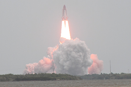 Space Shuttle Atlantis lifted off on its 135th and final mission into space July 8 2011 photo Alexander Krivenyshev World Time Zone