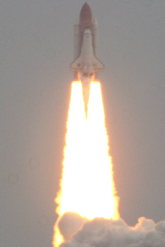 STS-135 crew on space shuttle Atlantis lifted off at 11:29 July 8 2011 photo Alexander Krivenyshev World Time Zone